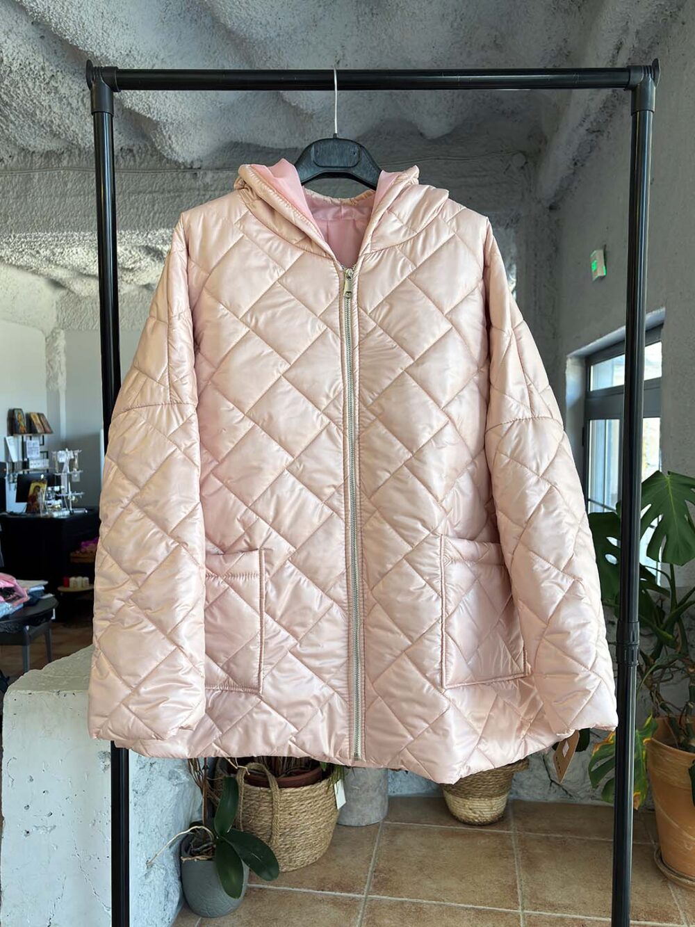 a dusty pink puffer